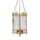 A mid 19th century English hexagonal brass hall lantern with scroll moulded frame, drop from rose