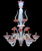 A 1950s Venetian pink and Vaseline glass six light chandelier with ornate flower and leaf motifs,
