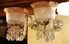 A pair of Victorian cut glass wall lights with etched frilled glass shades, height 32cm. depth