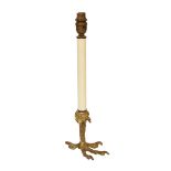 A French ormolu table lamp with eagles foot base and simulated candle stem, height 41cm