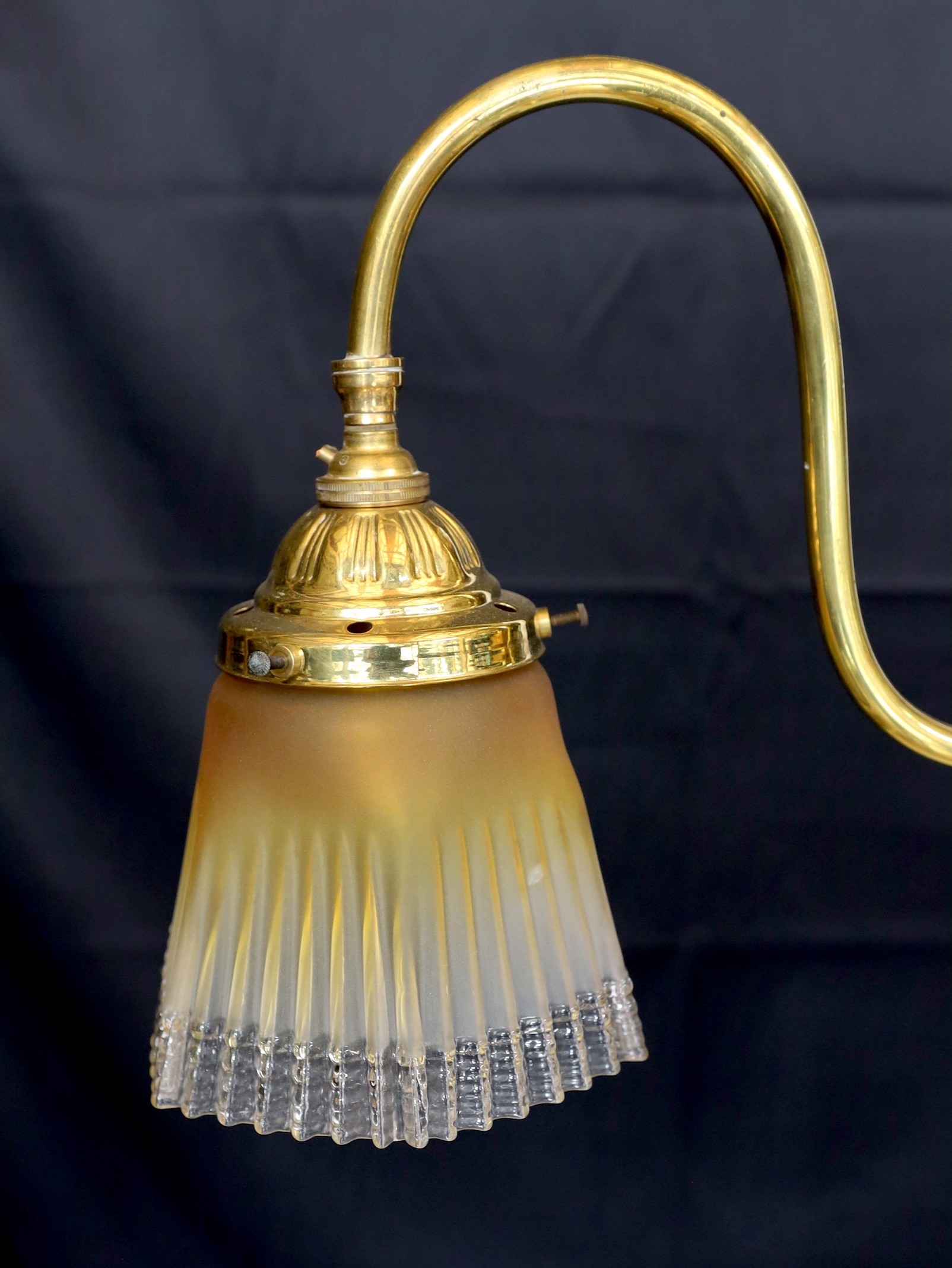 An early 20th century English brass twin branch light fitting with amber tinted tall glass shades - Image 2 of 4