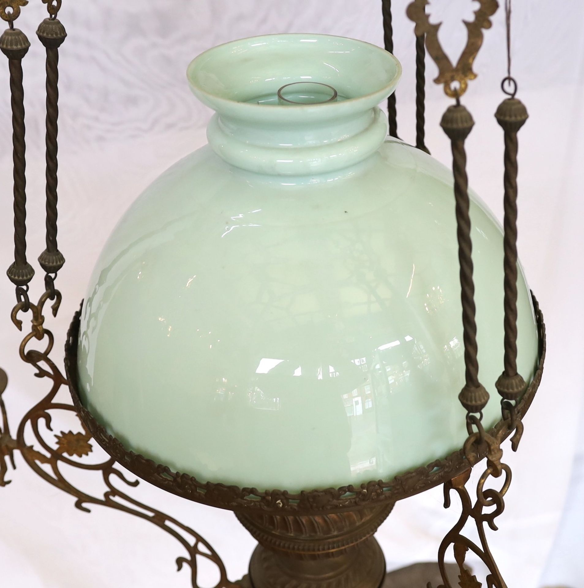 A Victorian brass counterbalanced hanging oil lamp with opaque blue glass shades and six candle - Image 2 of 4