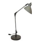 A 1950s Swiss enamelled and painted metal anglepoise lamp, height 56cm to the bend