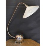 A stylish nickel plated desk lamp, with conical opaque white glass shade and loaded spherical