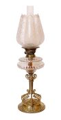 A late Victorian brass and cut glass oil lamp with duplex mechanism and frosted glass shade, height
