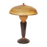 A 1930s French black phenolic and coppered metal table lamp, height 49cm
