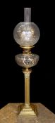 A late Victorian/Edwardian Corinthian column brass oil lamp, with cut glass reservoir, J.R.Roberts