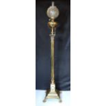 A Victorian brass Regency style Corinthian column telescopic oil lamp standard, with later etched