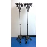 A pair of wrought iron Prickett lamp standard candlesticks, in the 18th century manner, height