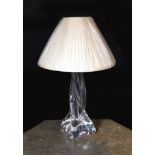 A 1960s Baccarat clear crystal glass table lamp, of twisted form, with replacement pleated silk