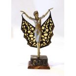 A 1920s French composition and metal butterfly dancer table lamp, on marble plinth, height 42cm