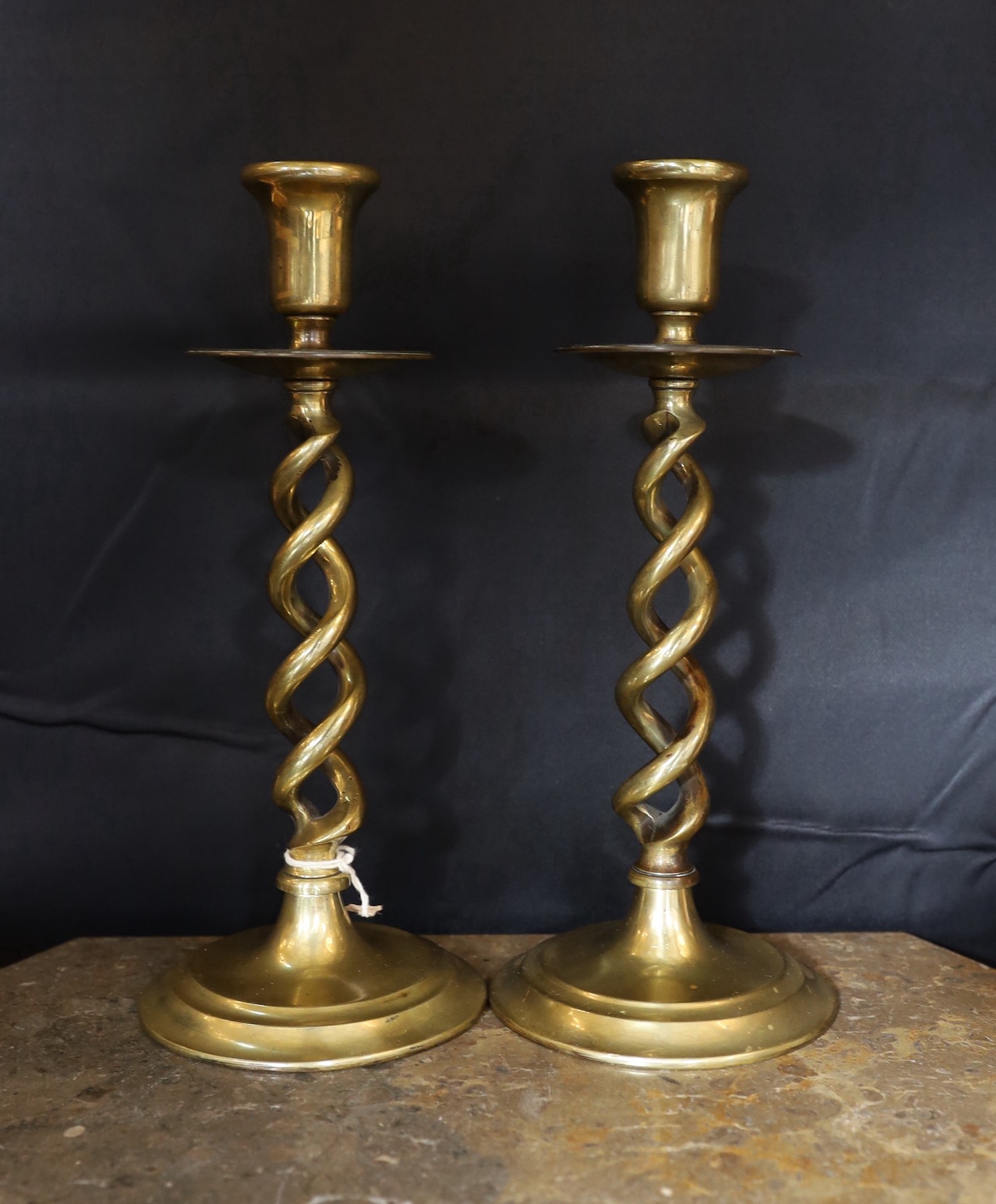 A pair of Victorian brass spiral twist candlesticks and a later seven light candelabrum, - Image 3 of 4