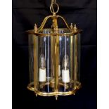 A pair of Georgian style lacquered brass globe hexagonal hall lantern, height 45cm. width 37cm