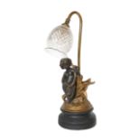 An Edwardian bronze spelter and brass table lamp with cut glass shade, height 46cm