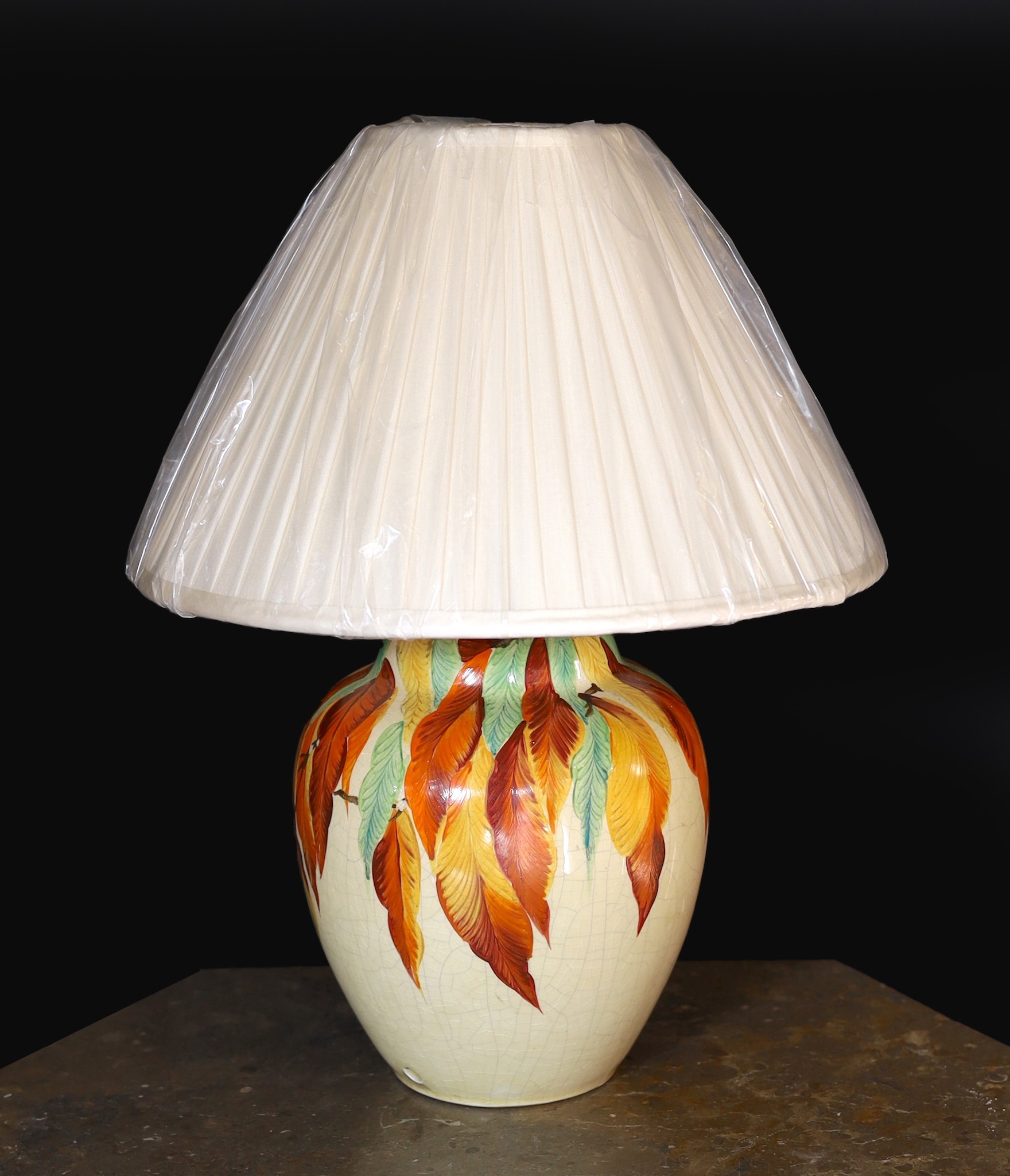 A 1930s English hand-painted pottery lamp base by Wait and Son of Midsham, Surrey, decorated with