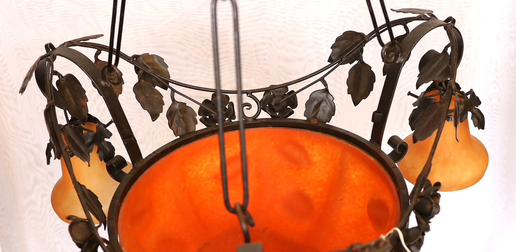 A 1930s French wrought iron and orange marbled glass light fitting decorated with rose motifs, - Image 3 of 3