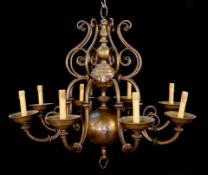 An early 20th century 17th century Dutch style brass eight light chandelier, height 82cm width