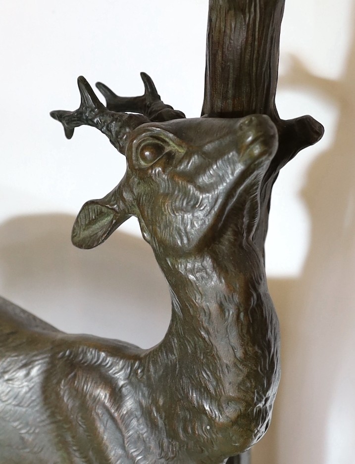 A 1930s French bronzed spelter and marble model of a deer standing beside a tree trunk, signed Cham, - Image 2 of 3