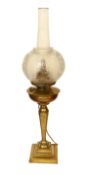 A late 19 century Austrian brass oil lamp with Ditmar mechanism and etched glass shade, converted to