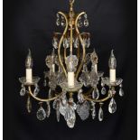 An early 20th century French bronzed metal and glass drop five light chandelier, height 63cm.