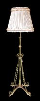 A late 19th century English brass and copper telescopic oil lamp standard converted to electricity,