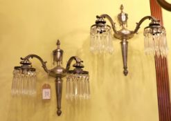 A pair of early 20th century English silver brass wall lights with cut glass drops, height 35cm***