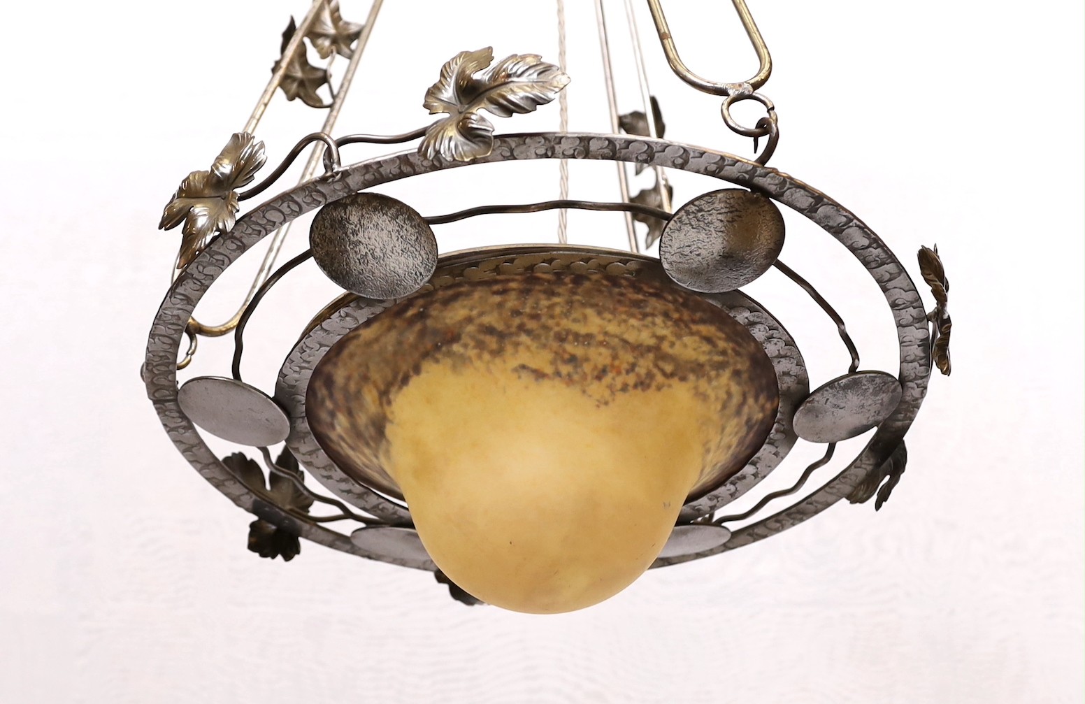 A 1920's-30's French polished wrought iron and marbled glass light fitting decorated with foliate - Image 2 of 5