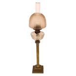 An Edwardian brass Corinthian column oil lamp with cut glass reservoir, improved duplex mechanism,