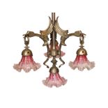 A 1930's Austrian silvered bronze four light chandelier decorated with stylised birds heads, with