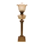 An Edwardian brass Corinthian column oil lamp with cut glass reservoir, Castle Brand mechanism and