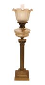 An Edwardian brass Corinthian column oil lamp with cut glass reservoir, Castle Brand mechanism and