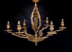 An early 20th century French gilt bronze rococo six light chandelier, height 59cm. width 66cm***