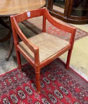 A Vico Magistretti for Habitat aniline red stained Carimate chair