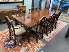 A late Victorian mahogany extending dining table, length 209cm extended with two spare leaves and