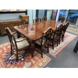 A late Victorian mahogany extending dining table, length 209cm extended with two spare leaves and