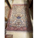 A North West Persian cream ground carpet, bird design, 204 x 136cm