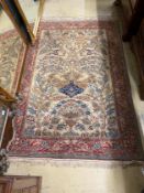 A North West Persian cream ground carpet, bird design, 204 x 136cm