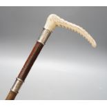 A stag horn handled riding crop, 61cms long