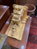 A George III style carved giltwood baroque style wall bracket, width 38cm, depth 30cm, height 48cm