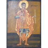 Greek School, tempera on wooden panel, Icon of a standing saint holding a candle, 33 x 24.5cm