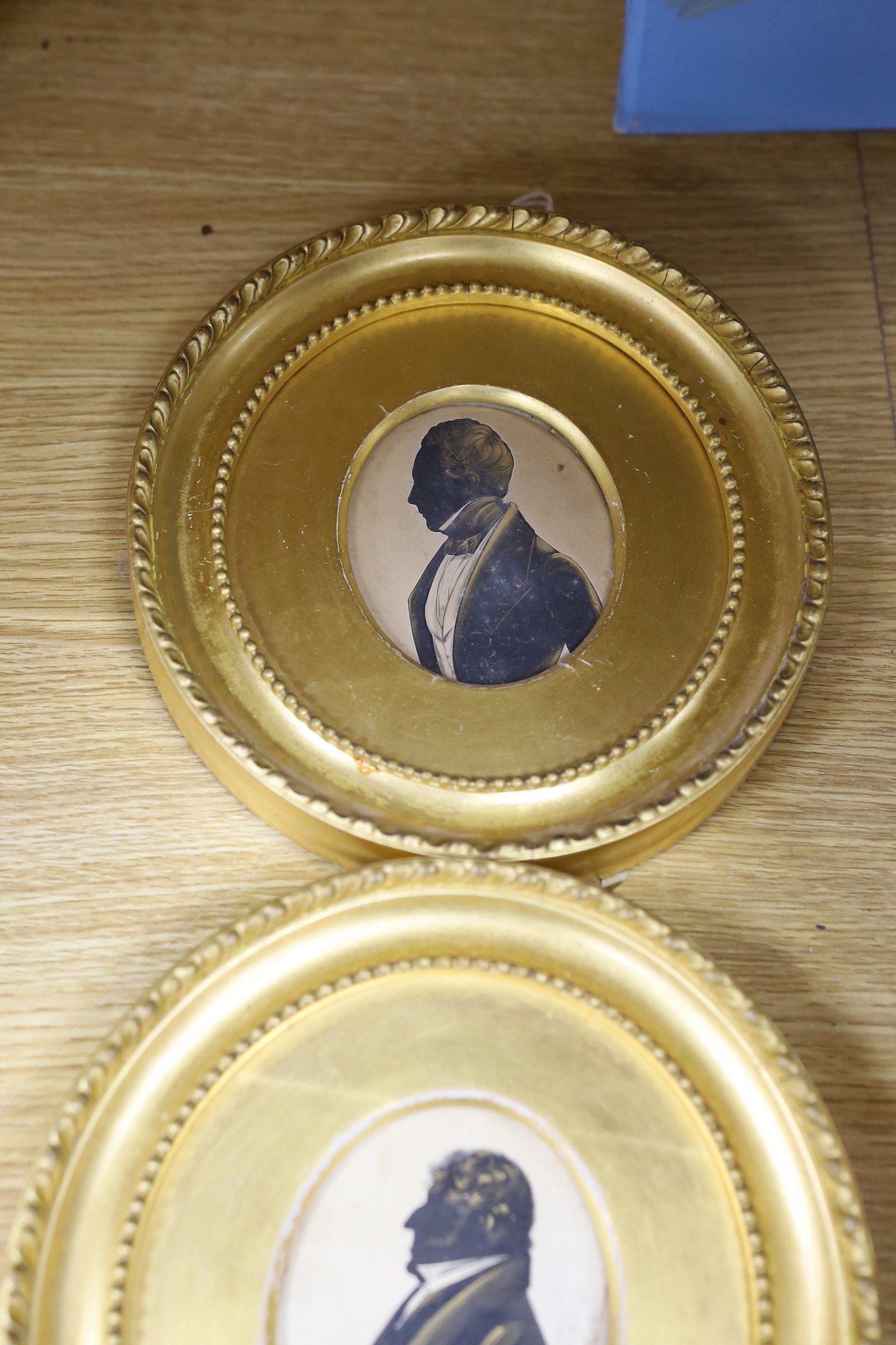 Victorian School, cut paper heightened with bronze, Silhouette of a gentleman, 8 x 6.5cm, with two - Image 4 of 4