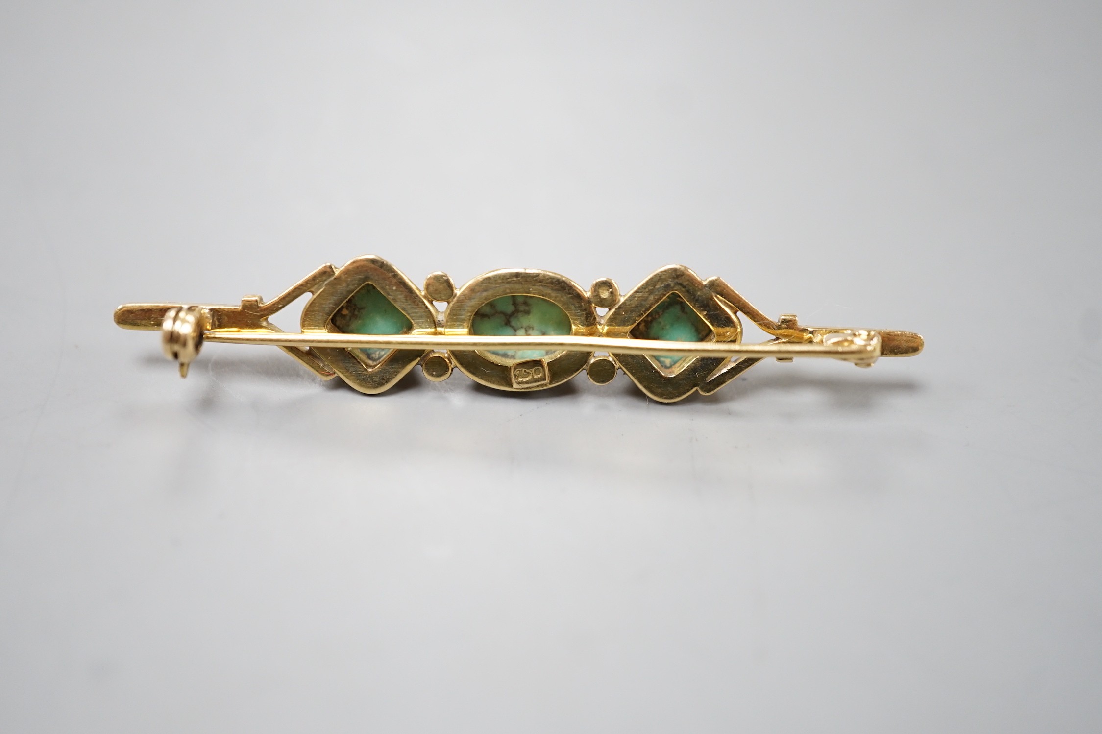 A 750 yellow metal and three stone shaped turquoise set bar brooch, 57mm, gross weight 6.6 grams. - Image 3 of 3