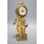 An early 20th century gilt metal cherubic mantel timepiece on onyx base, 29cm