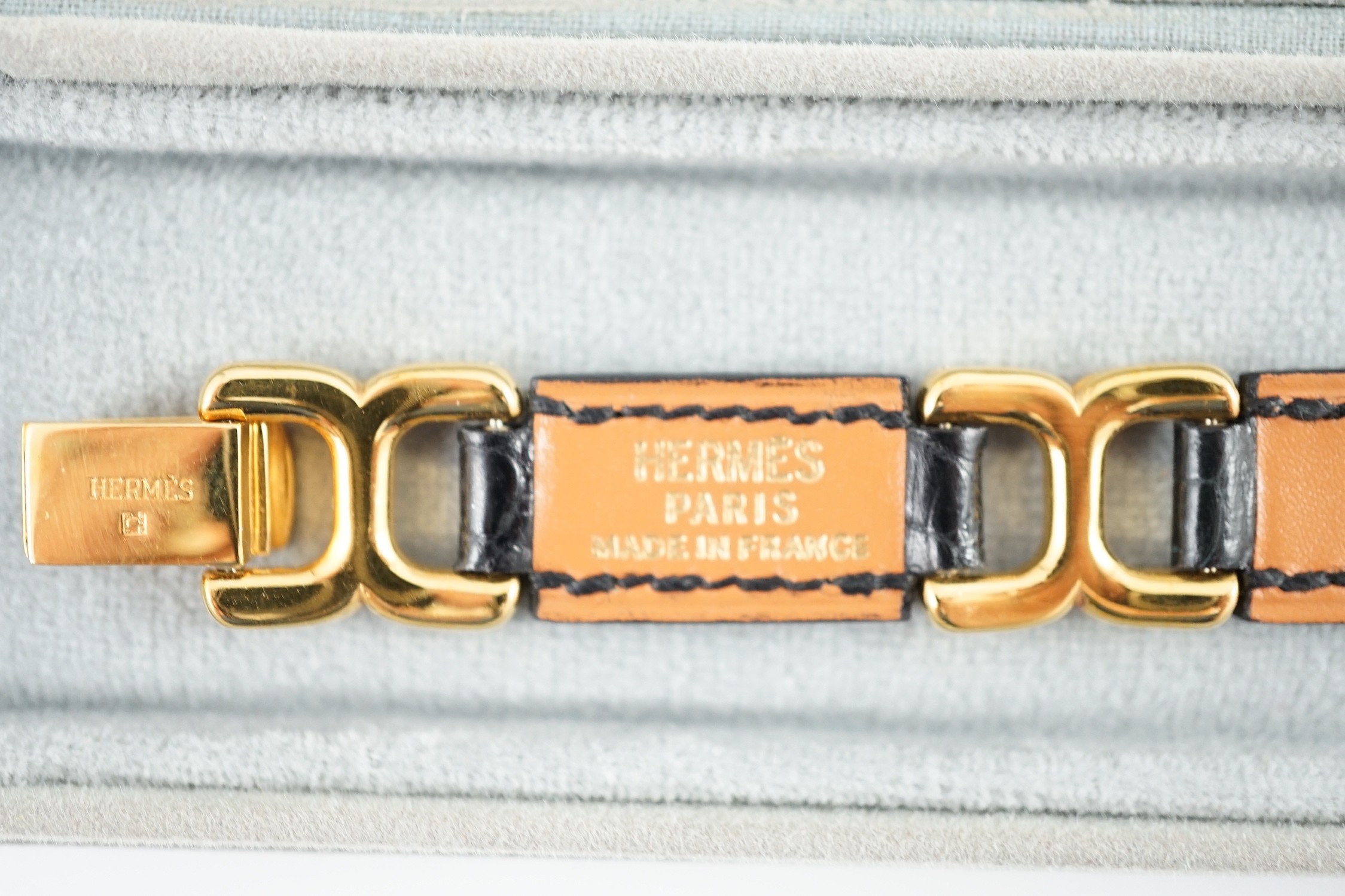 A boxed Hermes navy blue leather and gilt metal bracelet, 19cm. - Image 4 of 4