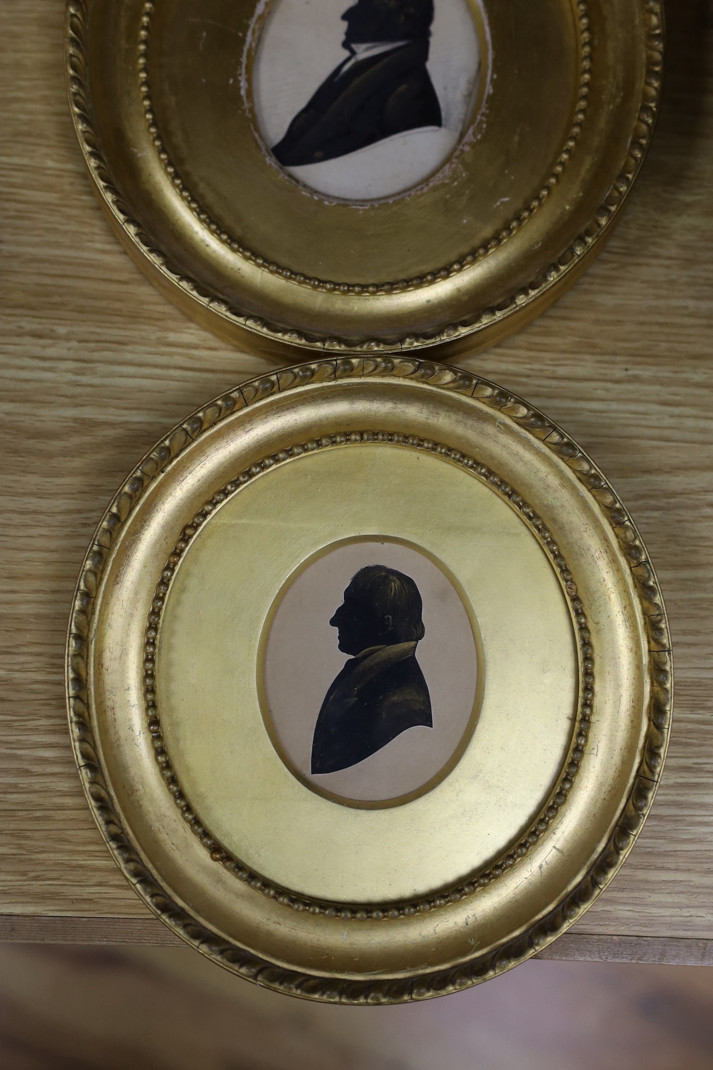 Victorian School, cut paper heightened with bronze, Silhouette of a gentleman, 8 x 6.5cm, with two - Image 2 of 4