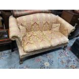 A George III style upholstered mahogany hump back two seater settee, length 156cm, depth 90cm,