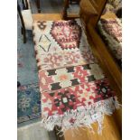 A Kilim polychrome flatweave carpet, 320 x 172cm