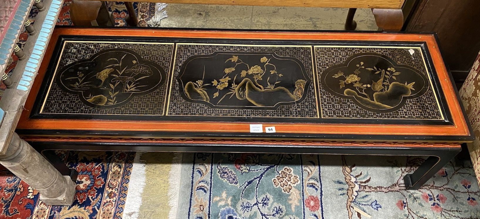 A Chinese black and red lacquered coffee table, the top inset three 18th century lacquer panels, - Image 2 of 2