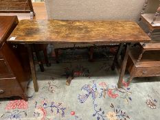 An 18th Spanish walnut rectangular topped table, with iron stretchers.Provenance: Gorringe’s,