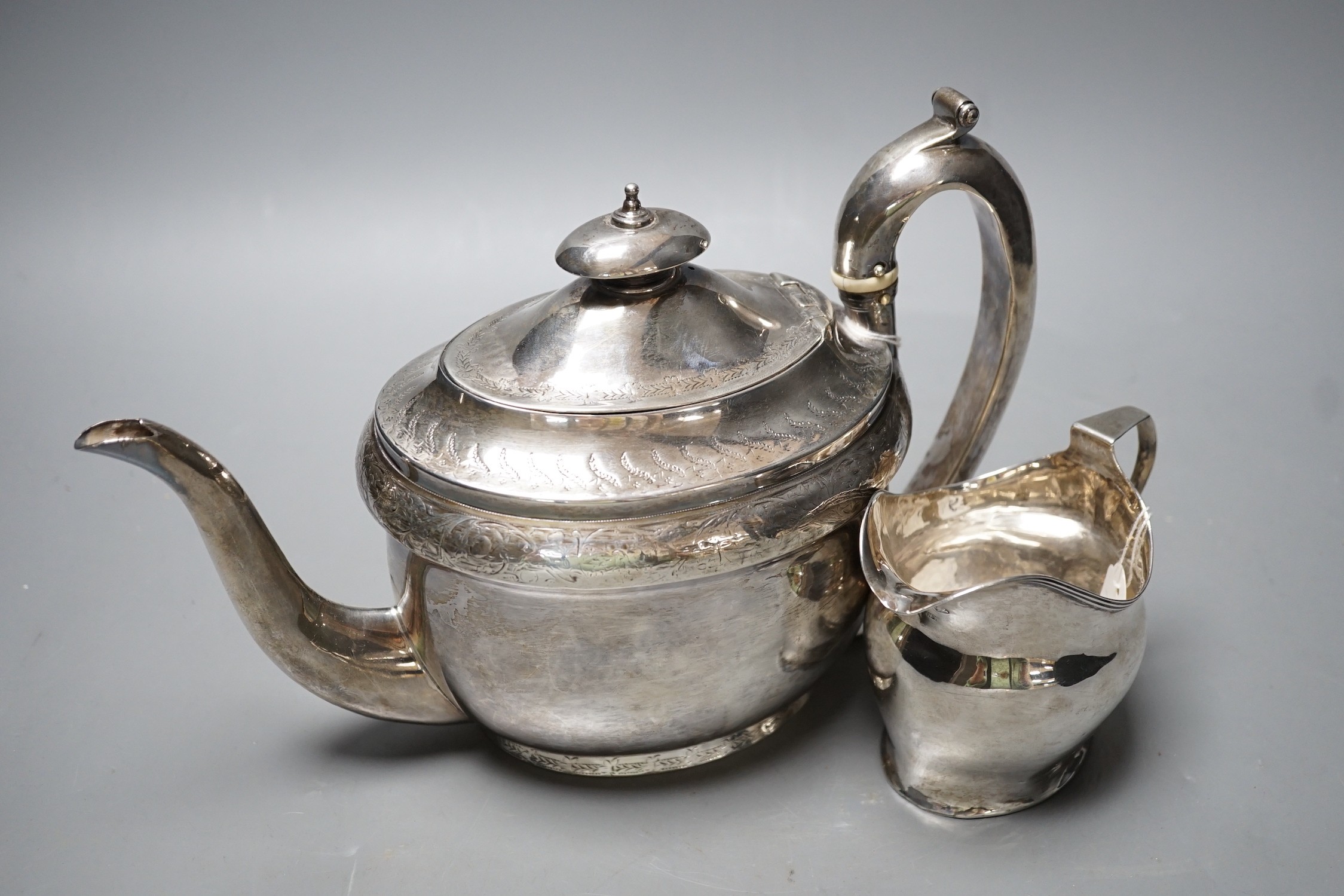 A George III engraved silver oval teapot on stand, Hannah Northcote? London, 1804 and Georgian - Image 2 of 4